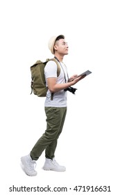 Full Length Portrait Of Happy Tourist Man Using Tablet On White Background