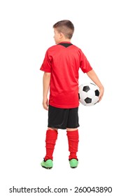 Full Length Portrait Of A Junior Soccer Player Holding A Ball Isolated On White Background, Rear View