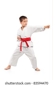 Full Length Portrait Of A Karate Child Exercise Isolated On White Background