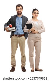 Full Length Portrait Of A Male And Female Teacher Standing And Holding Books Isolated On White Background