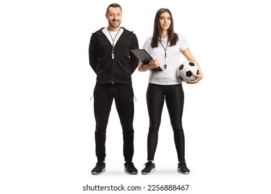 Full length portrait of a male and female football coaches posing isolated on white background

 - Powered by Shutterstock