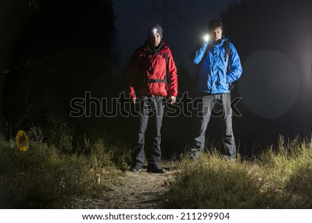 Similar – Image, Stock Photo People hiking at night. Mountains at sunrise. Man standing on peak. Natural mountain landscape with illuminated misty peaks, foggy slopes and valleys
