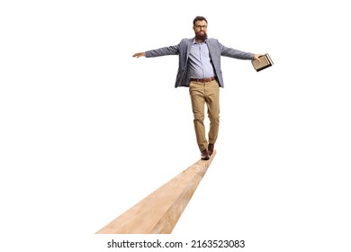 Full Length Portrait Of A Male Teacher Holdind A Book And Walking On A Wooden Beam Isolated On White Background