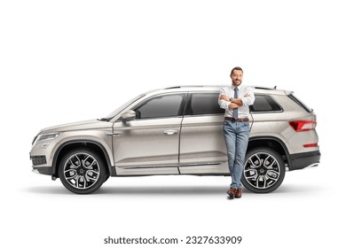 Full length portrait of a man leaning on a SUV isolated on white background - Shutterstock ID 2327633909