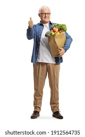 Full Length Portrait Of A Mature Man With A Grocery Bag Showing Thumbs Up Isolated On White Background