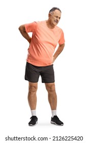 Full length portrait of a mature man in sportswear holding his painful spine isolated on white background