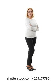 Full Length Portrait Of Mature Woman Standing Against White Background. 