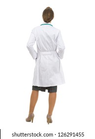 Full Length Portrait Of Medical Doctor Woman. Rear View