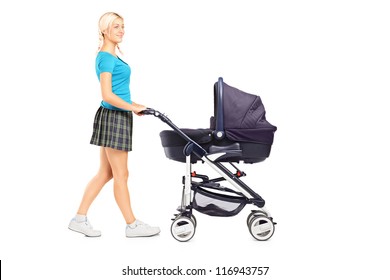 Full Length Portrait Of A Mother Pushing A Baby Stroller Isolated On White Background