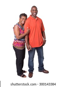 Full Length Portrait Of An Older African American Couple Standing Close And Holding Hands, Isolated