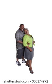 Full Length Portrait Of An Older Couple Standing Close Isolated