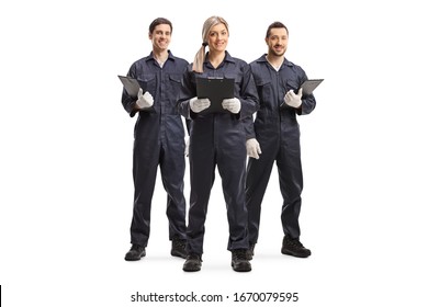 Full Length Portrait Of One Female And Two Male Workers In Overall Uniforms Isolated On White Background