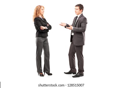 Full length portrait of a professional male and female having a conversation isolated on white background - Powered by Shutterstock