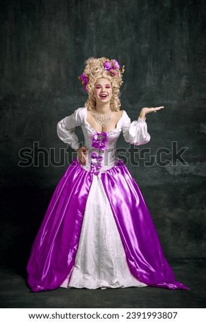 Full length portrait of queen, medieval person posing with bright make up and retro hairstyle against vintage background. Concept of comparison of eras, shopping, sales season, style, fashion, ad.