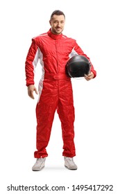 Full length portrait of a racer in a red uniform holding a helmet and smiling isolated on white background