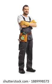 Full Length Portrait Of A Repairman With A Tool Belt And A Uniform Isolated On White Background