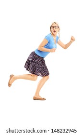 Full Length Portrait Of A Scared Woman Running Away Isolated On White Background