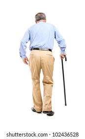Full length portrait of a senior man with cane walking isolated on white background