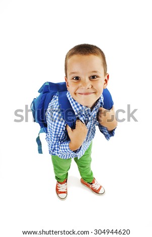 Full length portrait of a smiling school boy with backpack. Isolated on white background