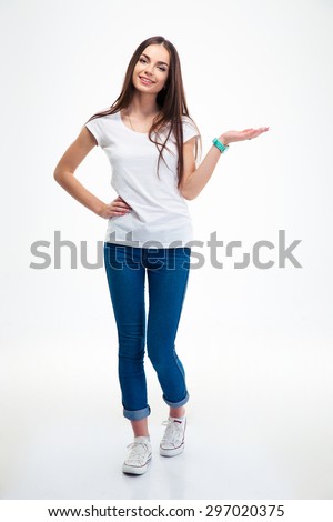 Similar – Image, Stock Photo Full body portrait of a young woman standing barefoot with long legs in a leopard print top and hot pants against a concrete wall looking challengingly at the camera