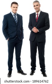 Full Length Portrait Of Two Businessmen