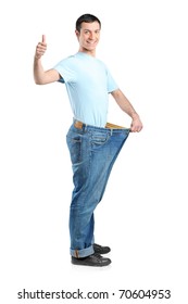 Full Length Portrait Of A Weight Loss Male With Thumb Up Isolated On White