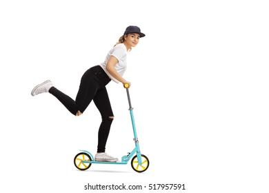 Full Length Portrait Of A Woman Riding A Scooter Isolated On White Background