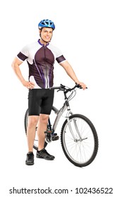 Full length portrait of a young bicyclist posing next to a bicycle isolated on white background