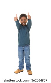 A Full Length Portrait Of A Young Boy Isolated On White