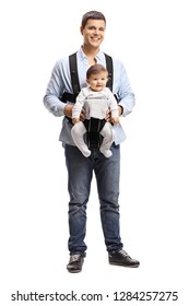 Full Length Portrait Of A Young Father With A Baby In A Carrier Isolated On White Background