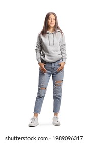 Full Length Portrait Of A Young Female Wearing A Hoodie And Ripped Jeans Isolated On White Background