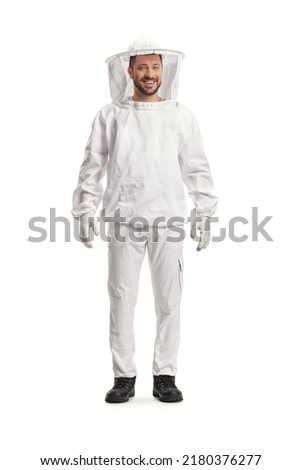 Full length portrait of a young male bee keeper in a uniform isolated on white background