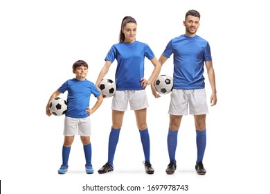 Full Length Portrait Of A Young Man, Woman And A Boy In Sports Jersey Holding Soccer Balls Isolated On White Background