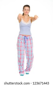 Full Length Portrait Of Young Woman In Pajamas Sleep Walking