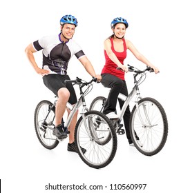 Full Length Portraits Of Young Male And Female Bikers On A Bike Isolated On White Background