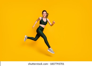 Full Length Profile Photo Of Lady Jump High Up Training Marathon Finish Line Wear Sports Suit Shoes Isolated Yellow Color Background