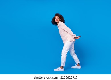 Full Length Profile Photo Of Lady Arms Hold Carry Big Empty Space Isolated On Blue Color Background