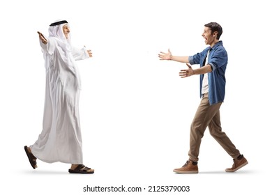 Full length profile shot of an arab man walking with open arms towards a young man isolated on white background