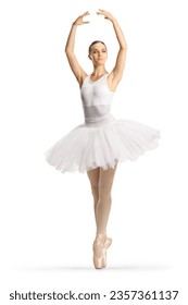 Full length profile shot of a ballerina in a white tutu dress dancing with arms up isolated on white background