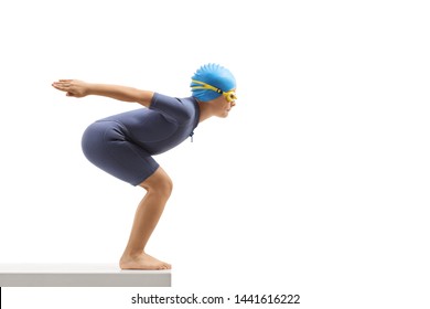 Full Length Profile Shot Of A Boy In A Wetsuit Getting Ready To Jump For A Swim Isolated On White Background