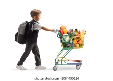 Full length profile shot of a boy in a school uniform pushing a mini shopping cart with fruits and vegetables isolated on white background

  

 - Powered by Shutterstock