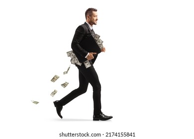 Full length profile shot of a businessman running with a briefcase full of money isolated on white background - Powered by Shutterstock