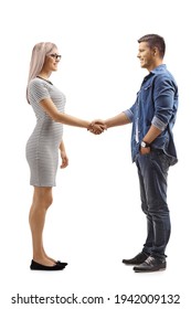 Full Length Profile Shot Of Casual Man And Woman Shaking Hands Isolated On White Background