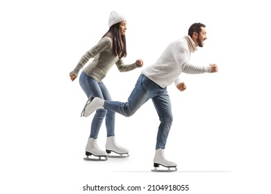 Full Length Profile Shot Of A Casual Man And Woman Ice Skating Isolated On White Background