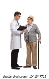 Full Length Profile Shot Of A Doctor Talking To An Elderly Patient Isolated On White Background