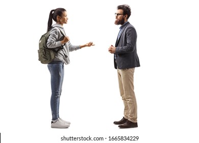 Full Length Profile Shot Of A Female Student Talking To A Bearded Man Isolated On White Background