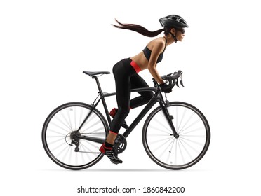 Full length profile shot of a female cyclist with a long ponytail waving, riding a road bicycle isolated on white background