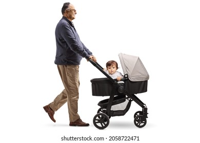 Full Length Profile Shot Of A Grandpa Walking A Baby In A Stroller Isolated On White Background