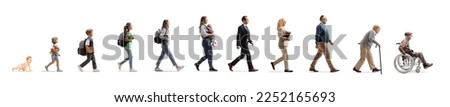 Full length profile shot of a group of people walking, from a baby crawling to a senior, isolated on white background