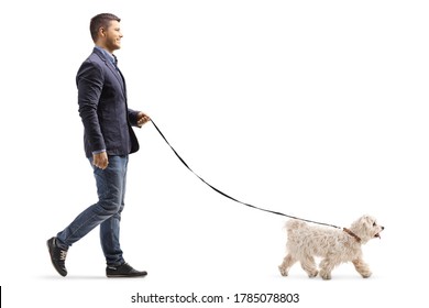 Full length profile shot of a guy walking a maltese poodle pet dog isolated on white background - Powered by Shutterstock